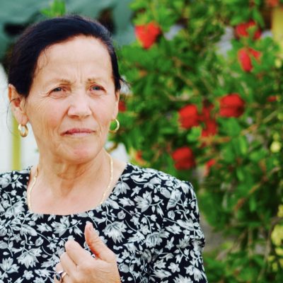 Photo of albanian woman in black dress