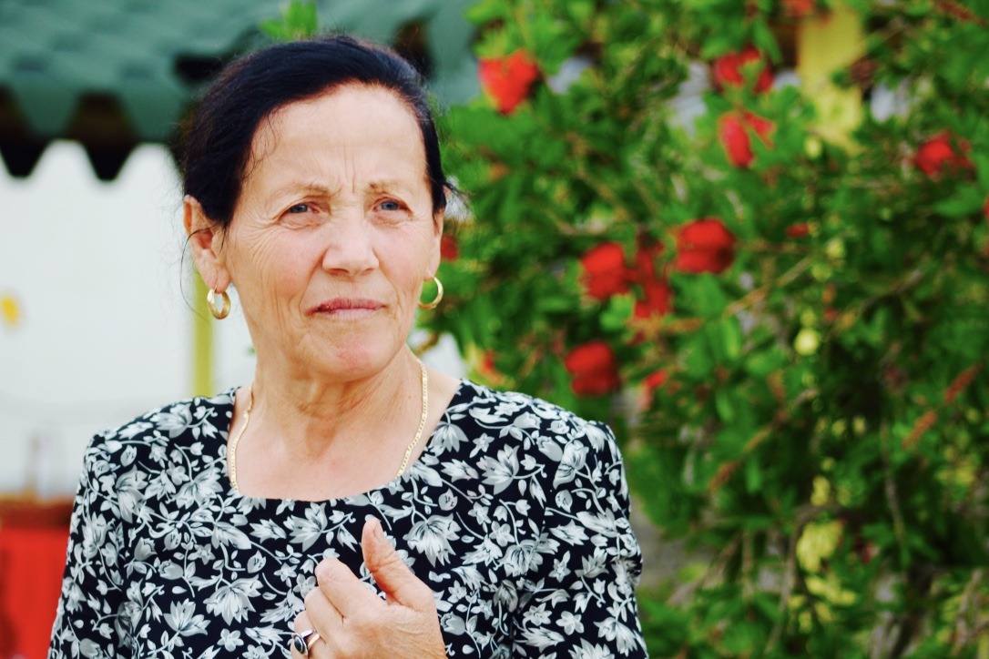 Photo of albanian woman in black dress