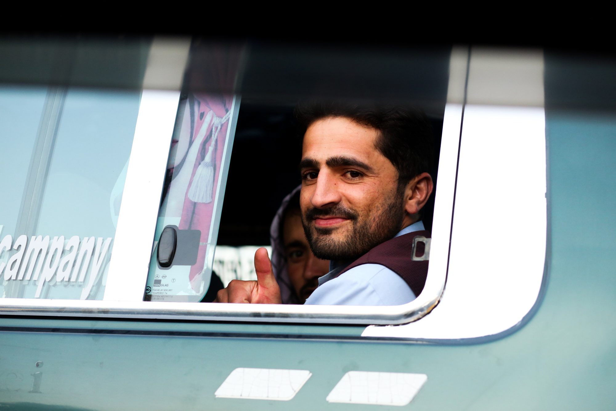 Photo of man in bus in Kabul