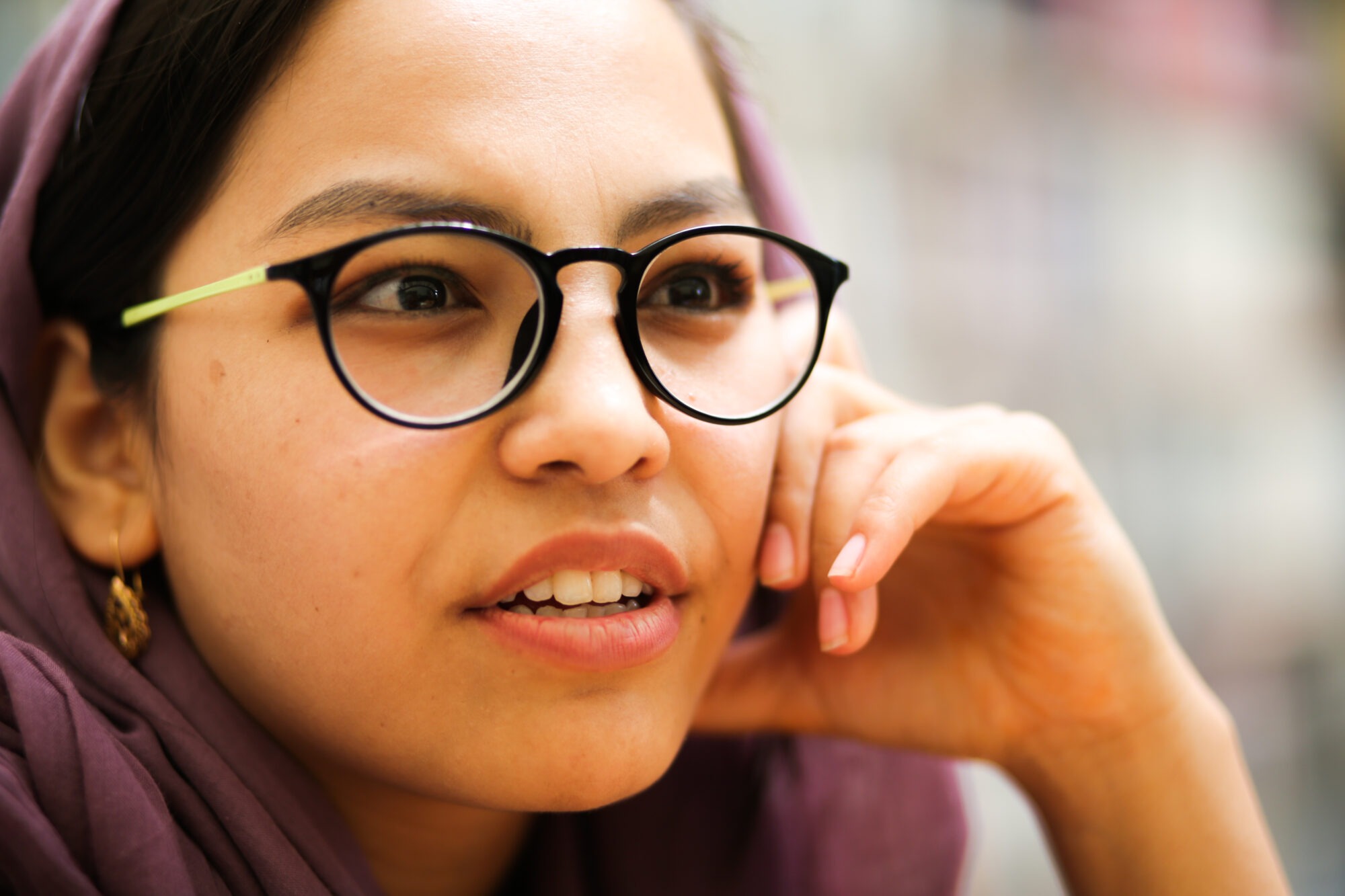 Photo of an Afghani woman in glasses