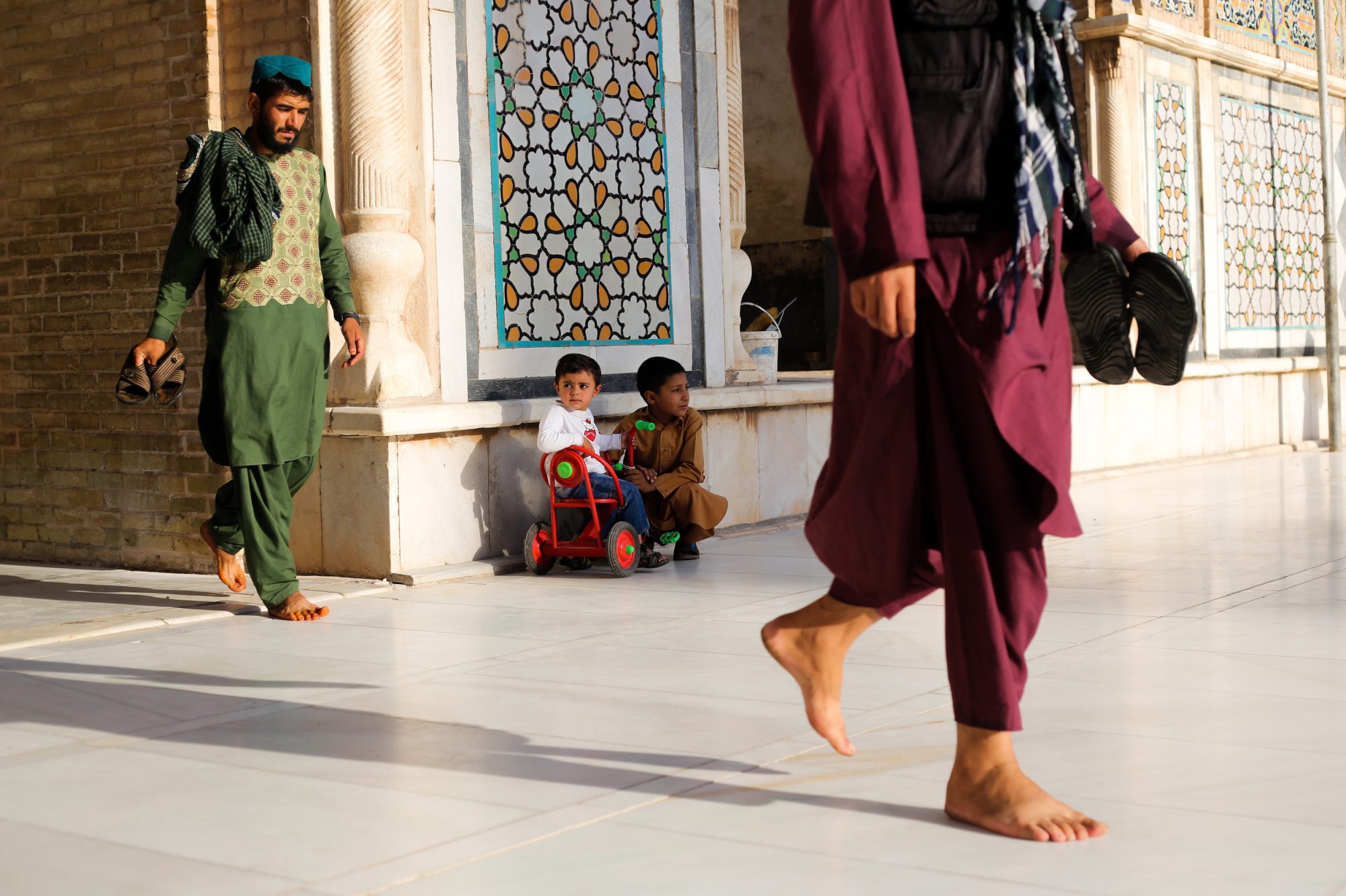 Photo of people walking in Herat