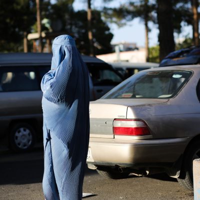 Photo of a person walking in Herat