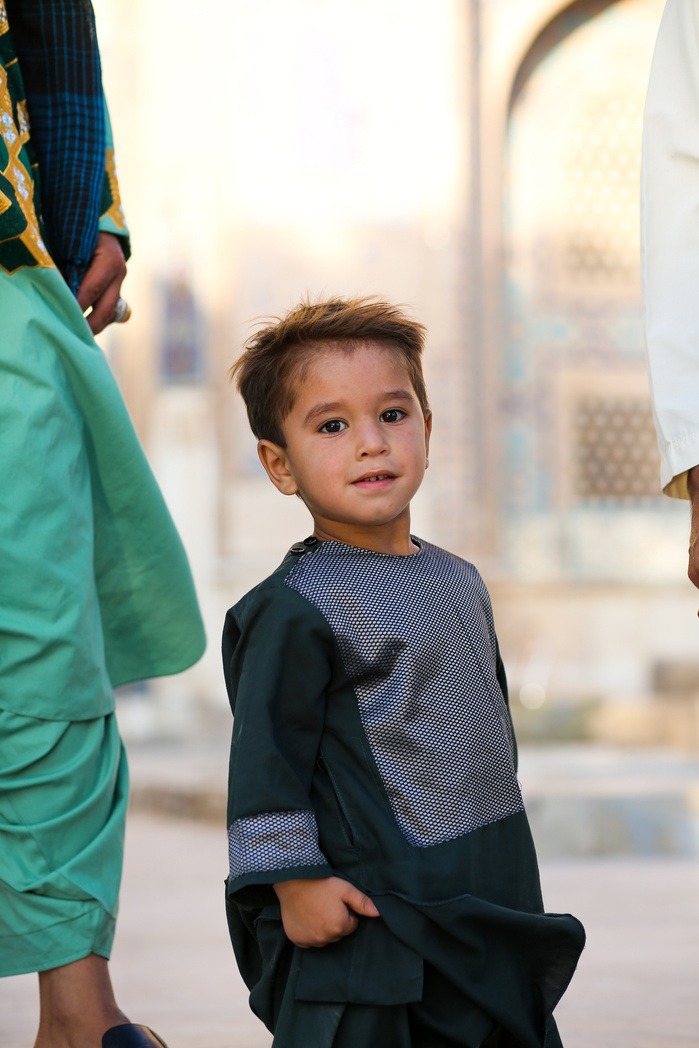 Photo of a smirking child in Herat