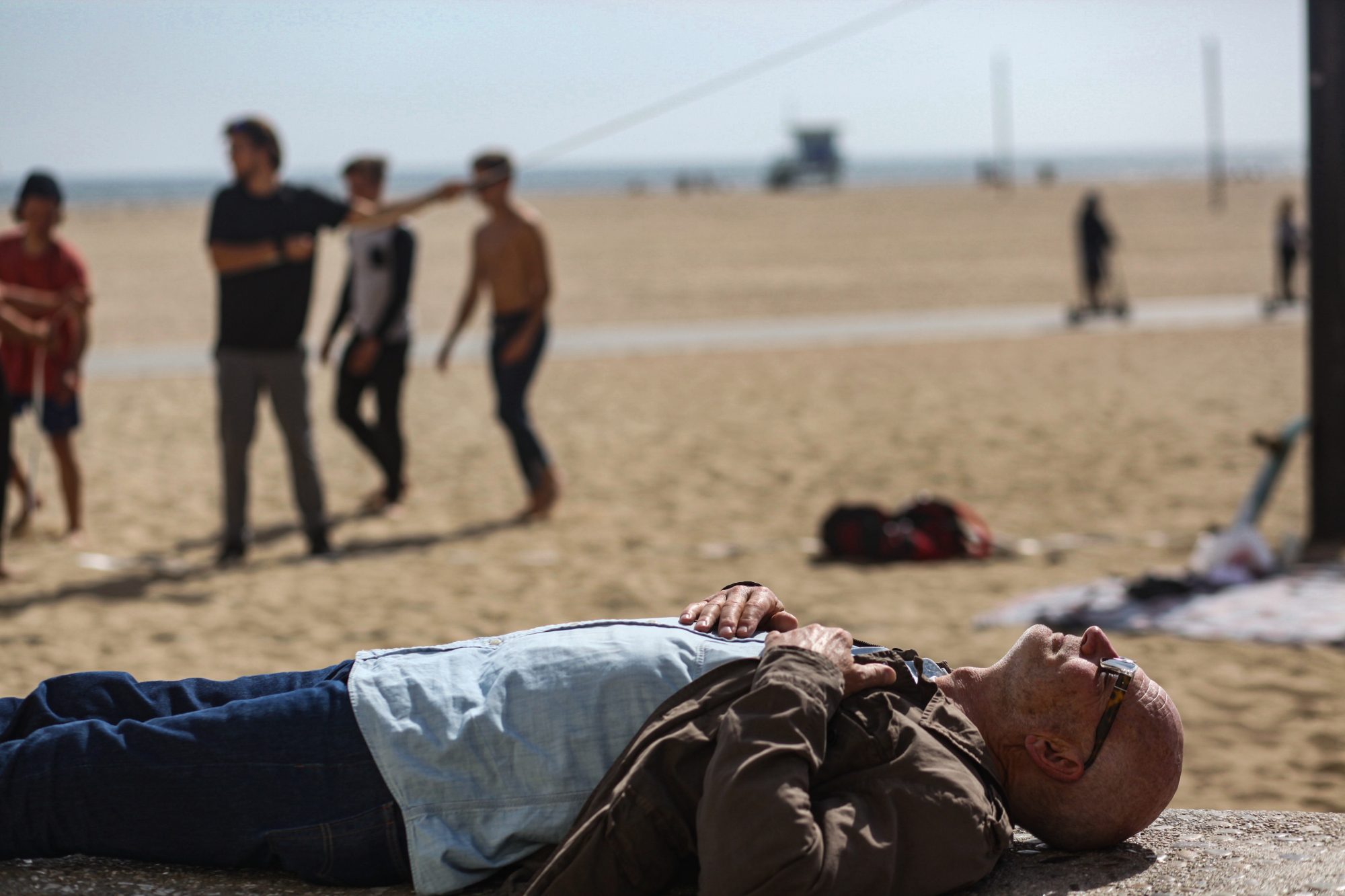 Photo of a person laying on a beach